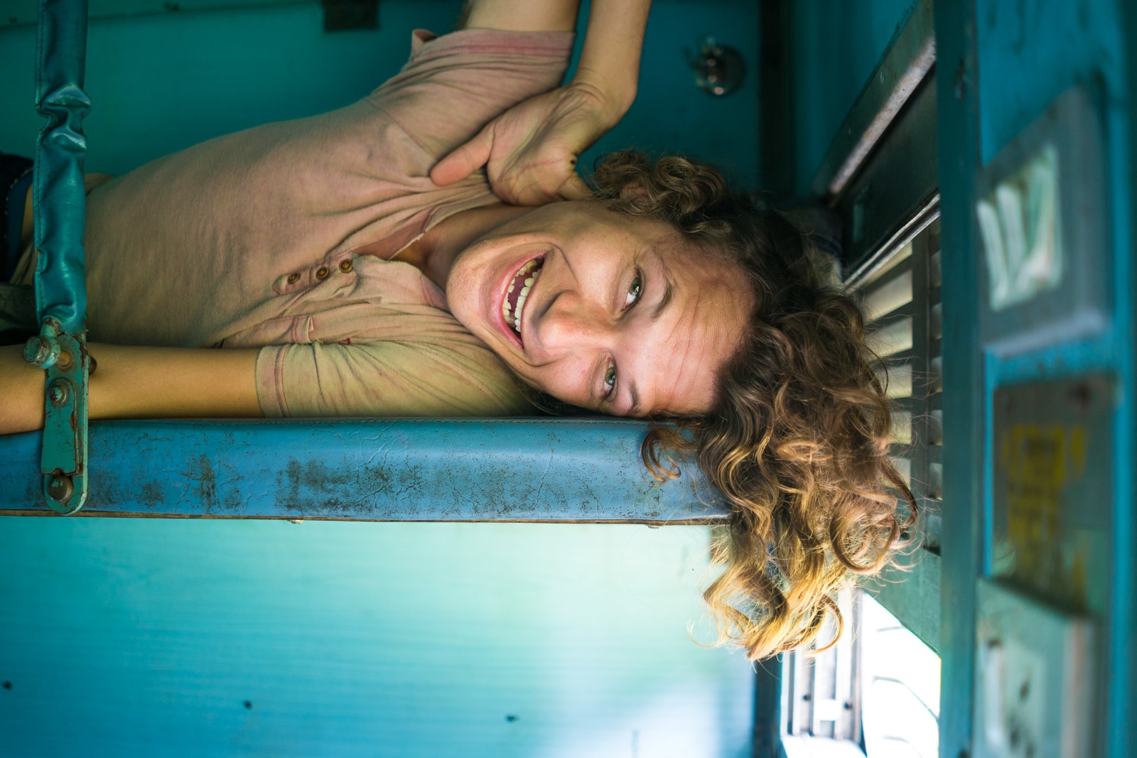 About Lost With Purpose Travel Blog - Sebastiaan lying down on a sleeper class train in India