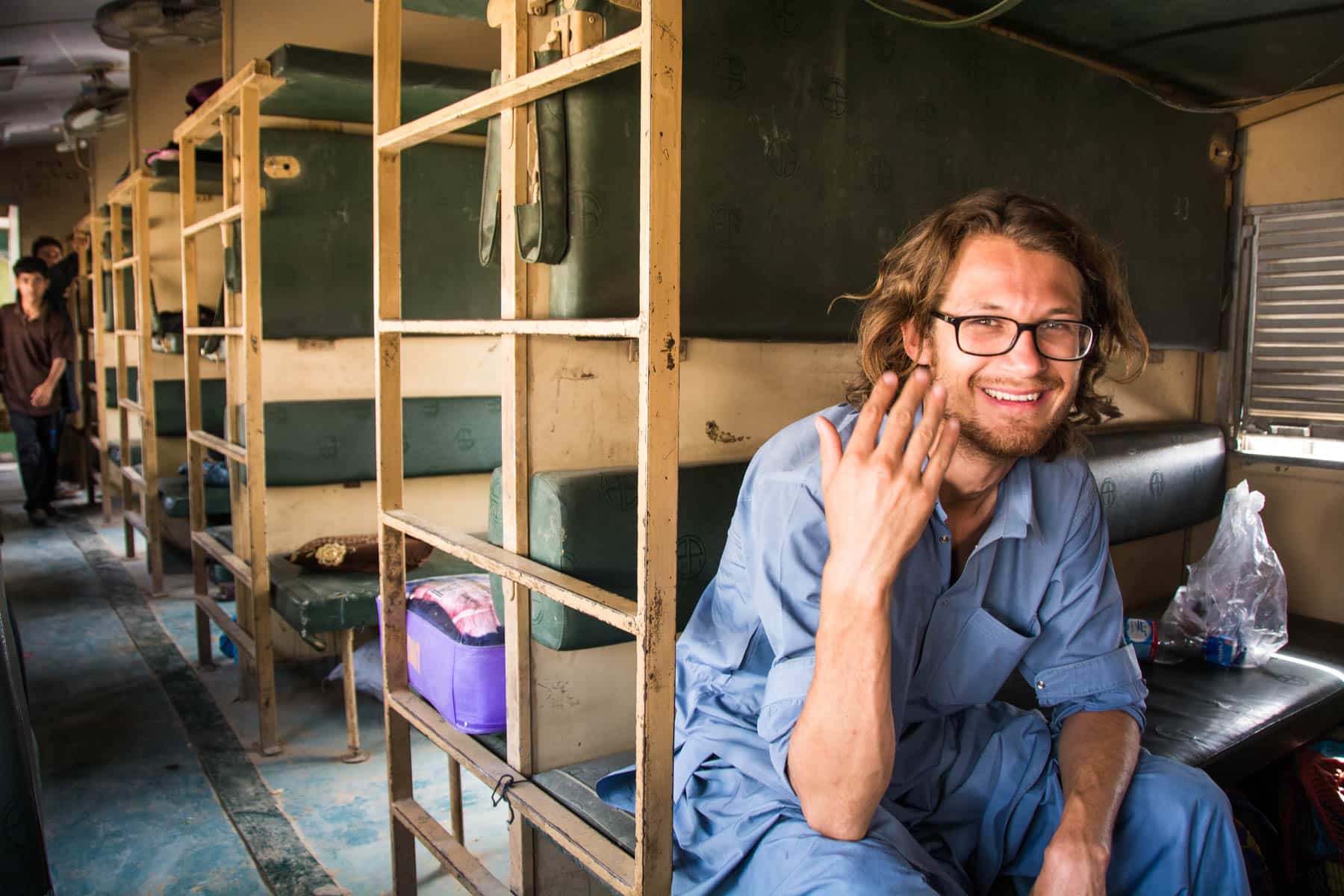 Guide to train travel in Pakistan - Melting in non-AC train class - Lost With Purpose travel blog