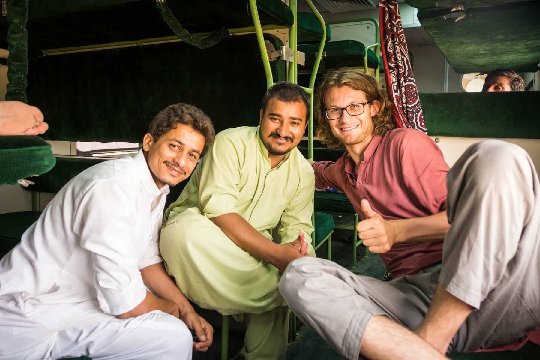 Guide to train travel in Pakistan - Making friends on the train - Lost With Purpose travel blog