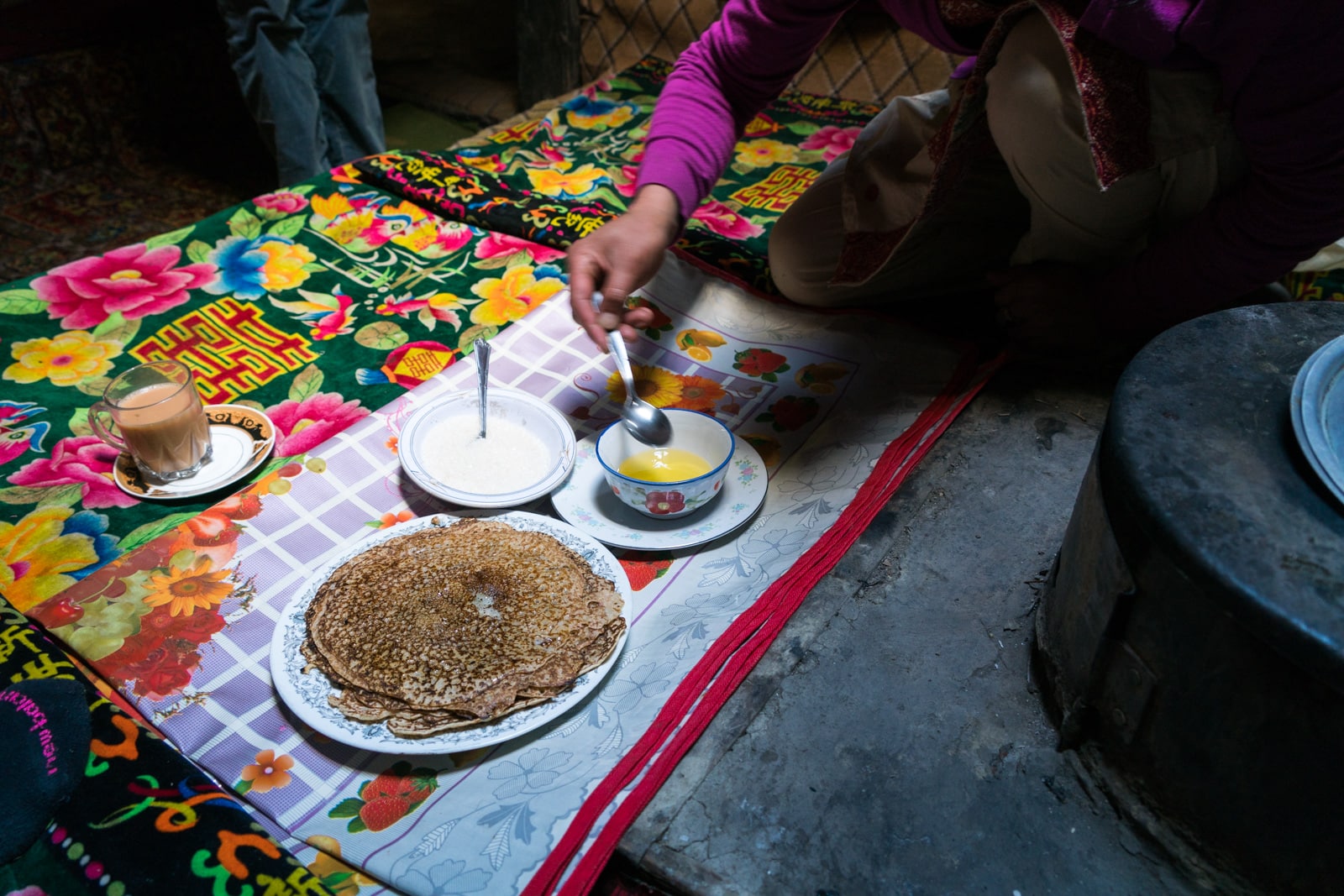 Homestay in Pakistan - Homemade pancakes and apricot oil as a snack - Lost With Purpose travel blog