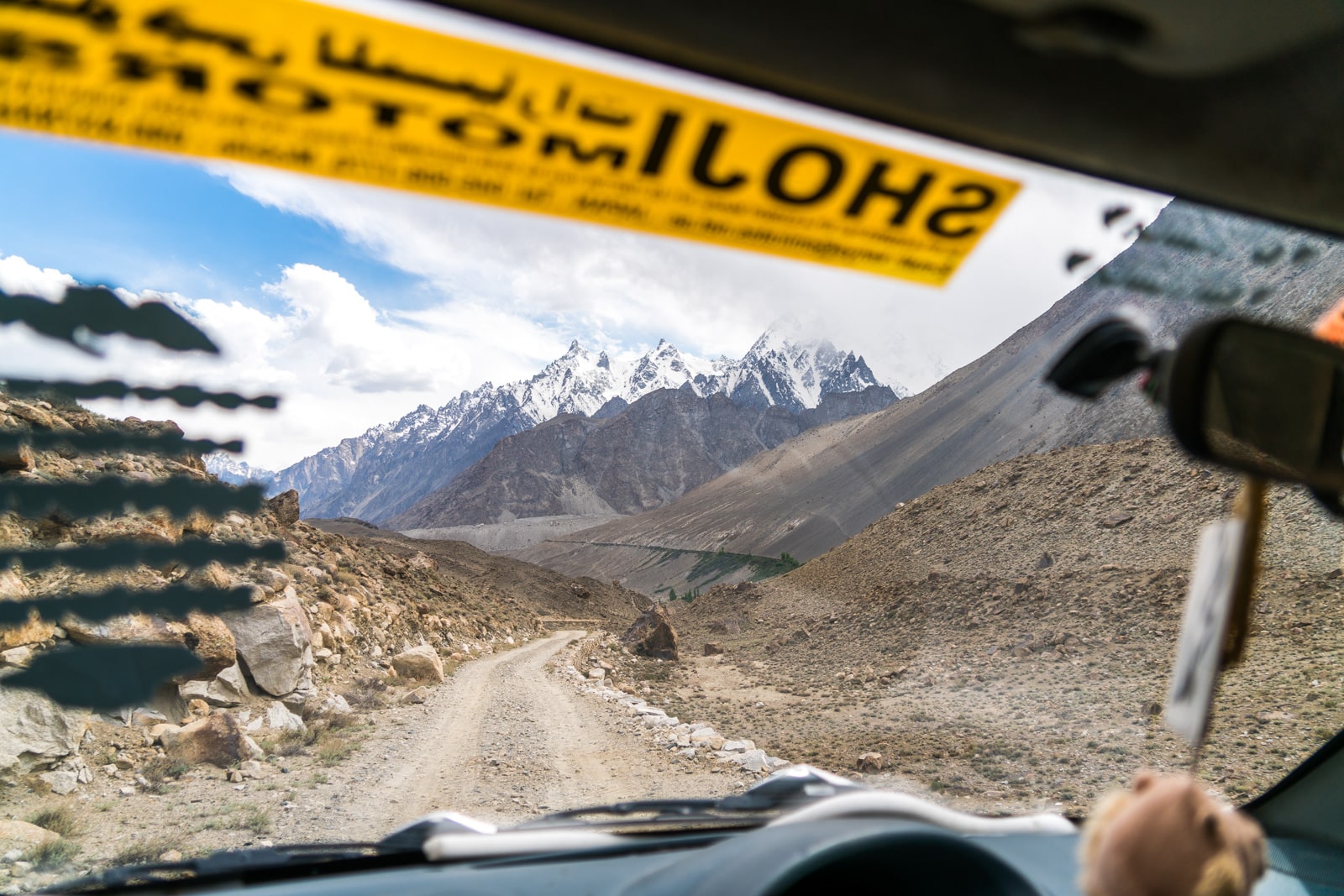 Homestay in Pakistan - Rehman driving to the white glacier - Lost With Purpose travel blog