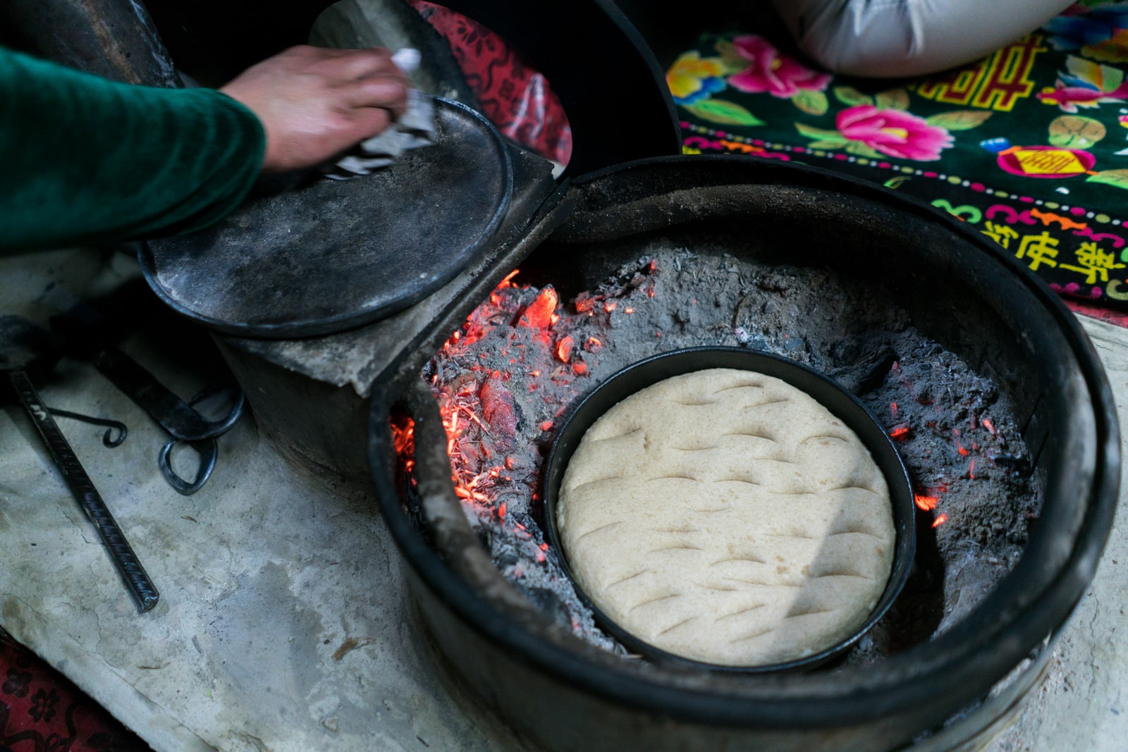 Homestay in Pakistan - Bread baking in the fire - Lost With Purpose travel blog