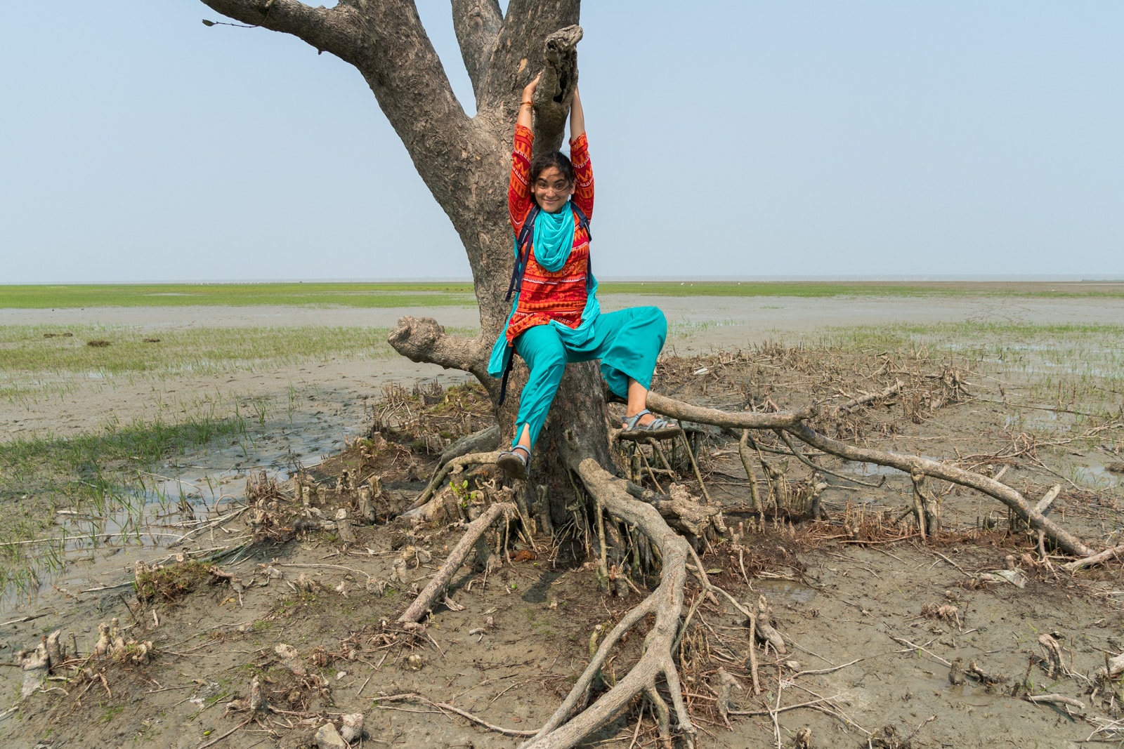 What is Lost With Purpose? - Alex swinging on a tree in Hatiya, Bangladesh - Lost With Purpose travel blog