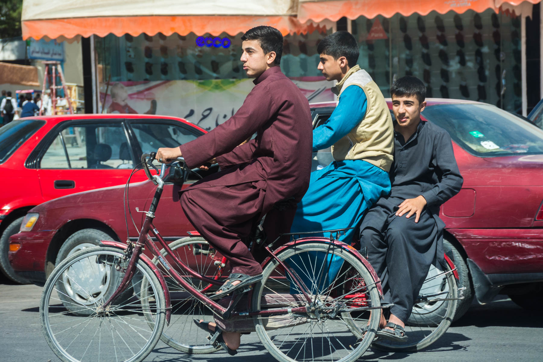Boys biking in Herat, Afghanistan