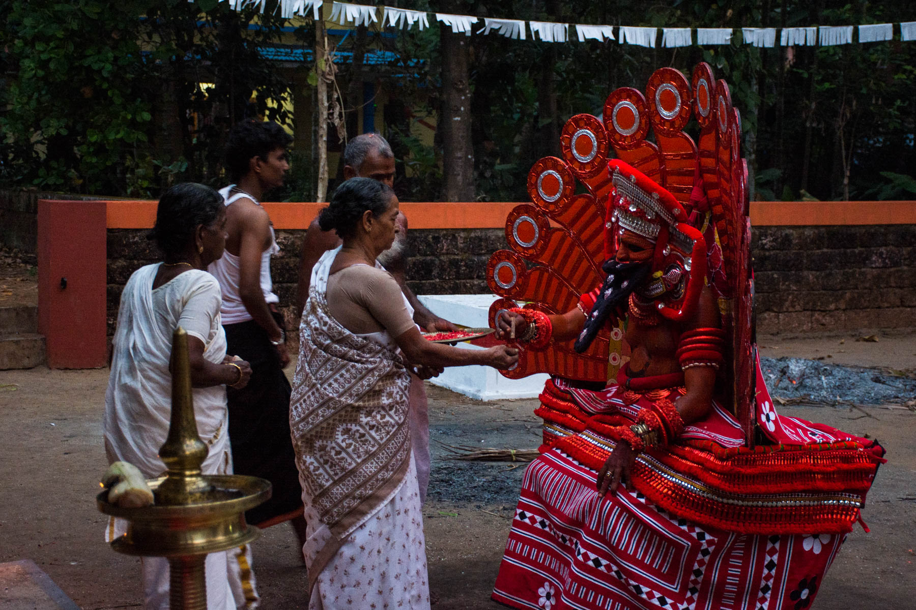 People coming to receive blessings from Kutty