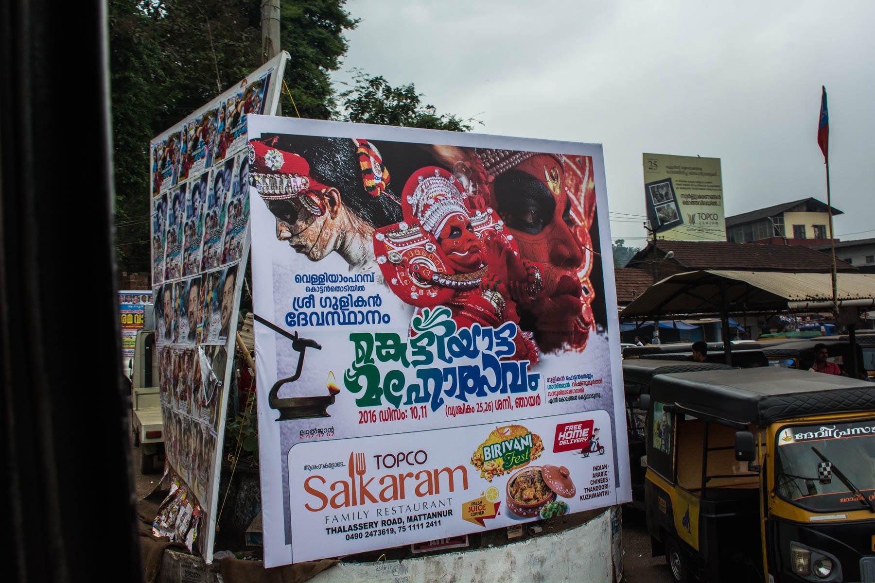 Sign telling where to see Theyyam in Kerala, India