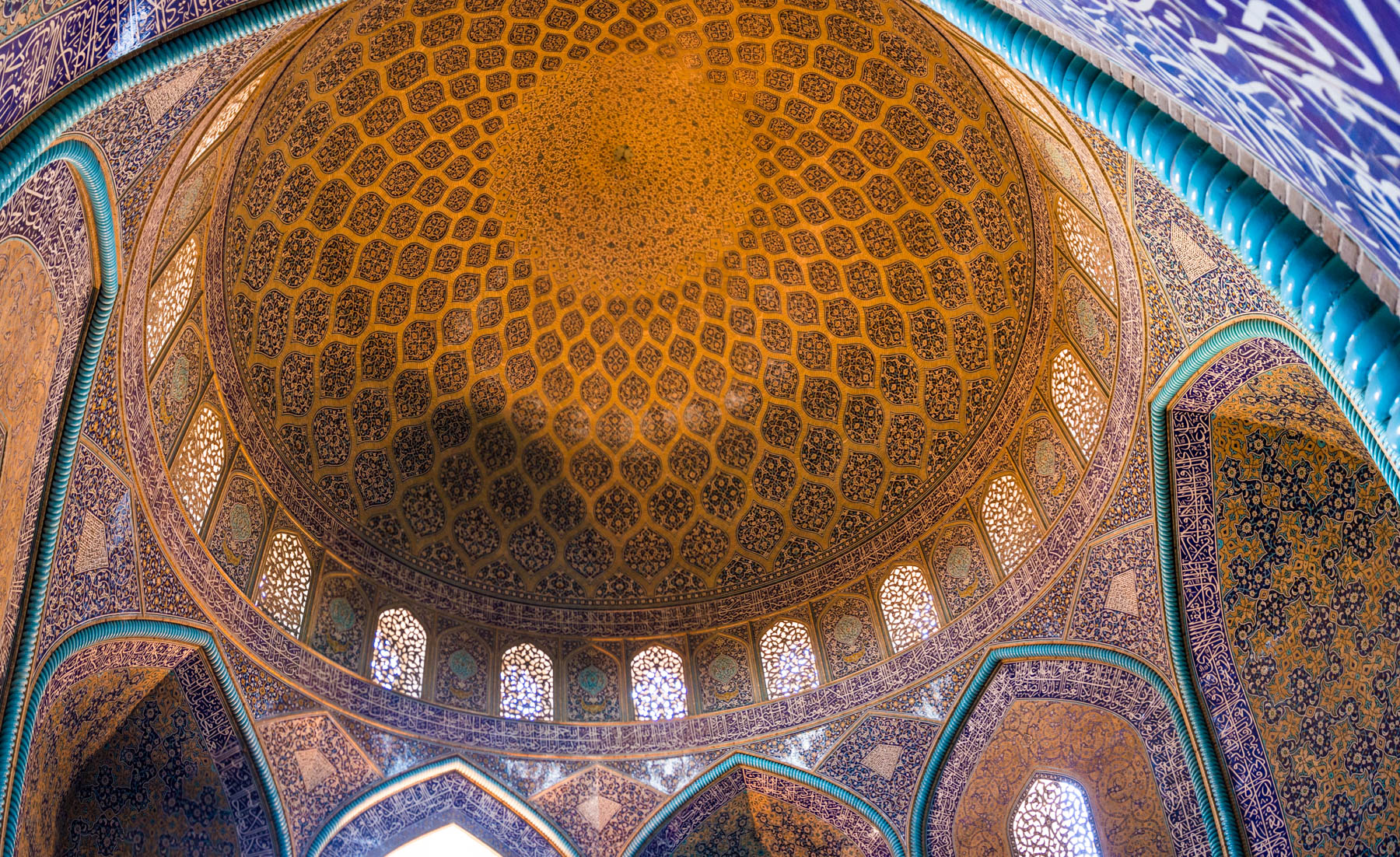 A two week Iran travel itinerary - The ceiling of the Sheikh Lotfallah mosque in Esfahan, Iran - Lost With Purpose