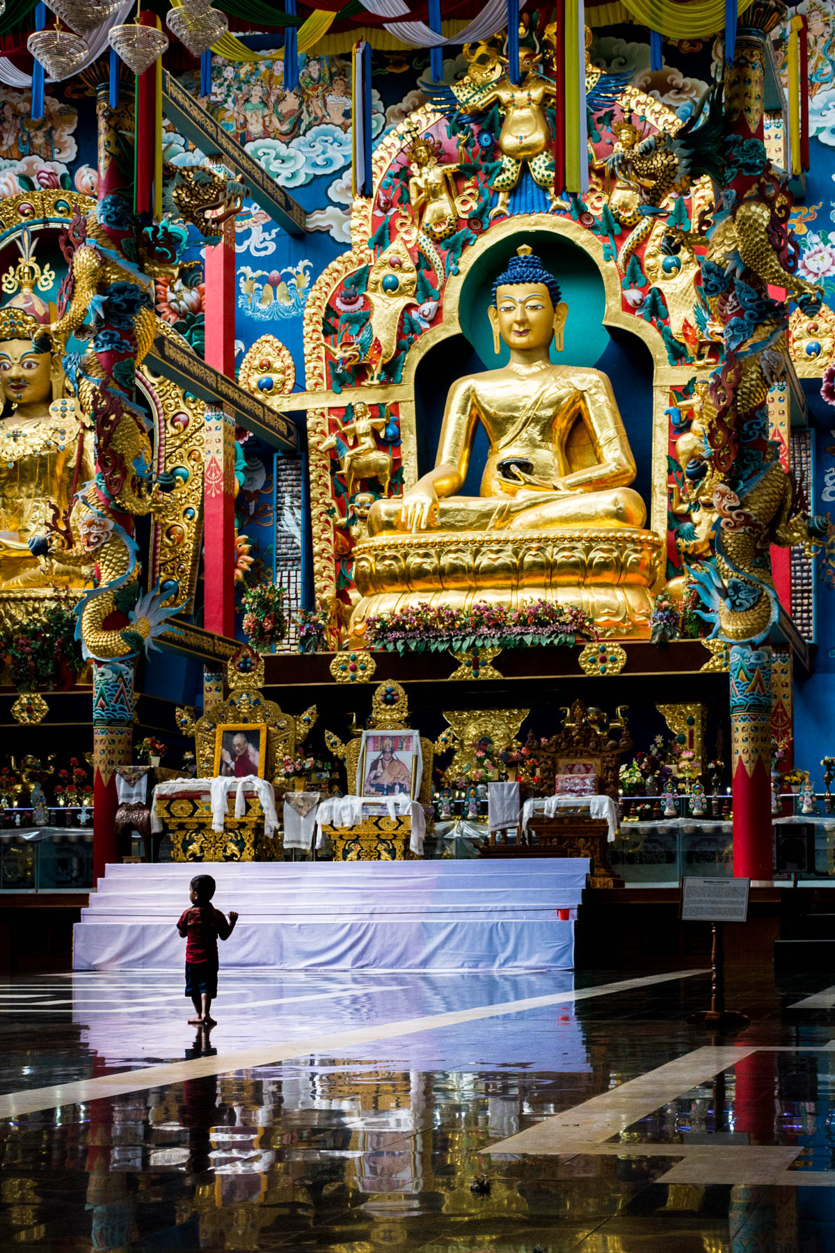 The interior of Namdroling Monastery (AKA the Golden Temple), a Buddhist monastery in Bylakuppe, India's second largest Tibetan settlement. Bylakuppe is a great destination to visit if you're looking for off the beaten track places in Karnataka state!