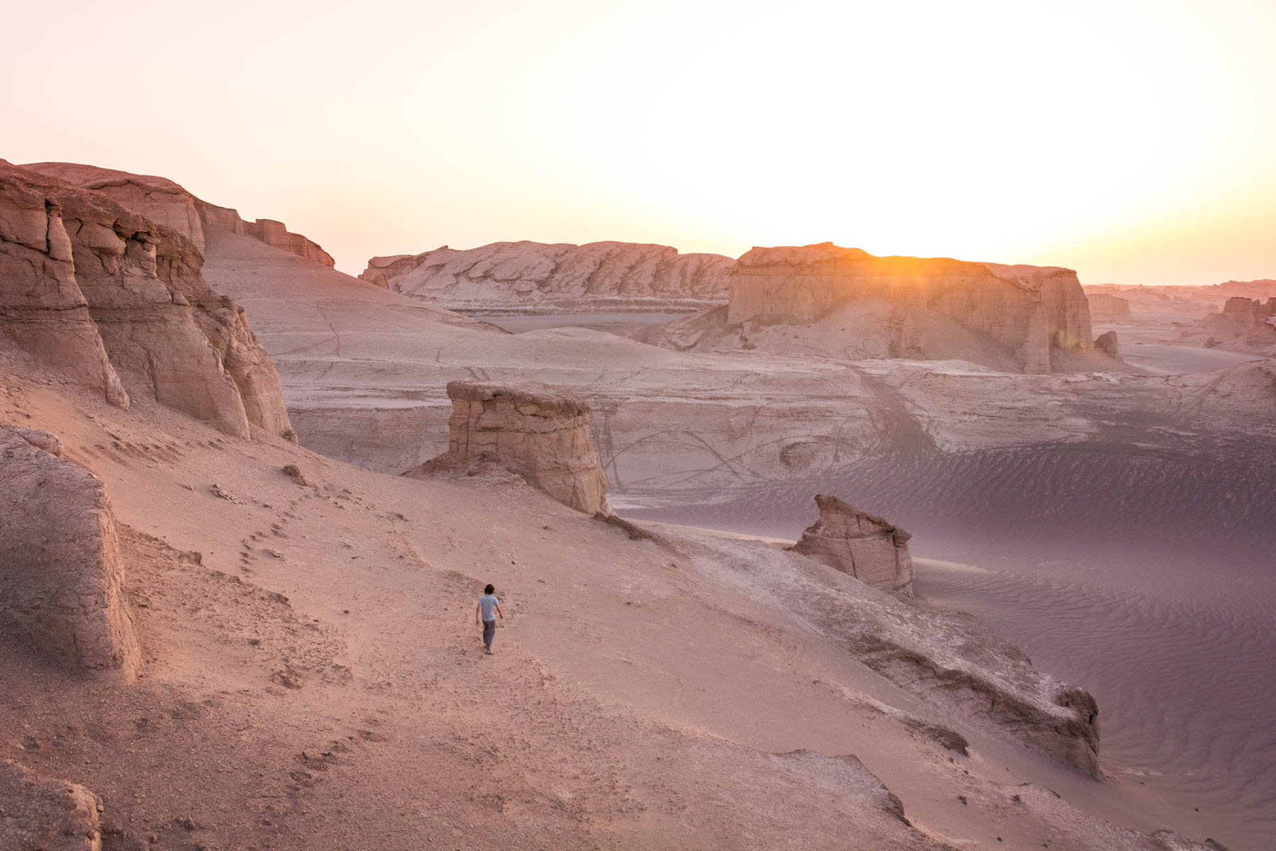 Two week Iran travel Itinerary - Sunrise over the Kaluts desert near Kerman, Iran - Lost With Purpose