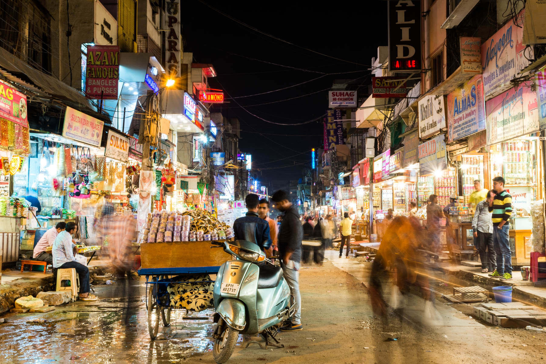 Boys loitering on the street at night in Hyderabad, India - Lost With Purpose