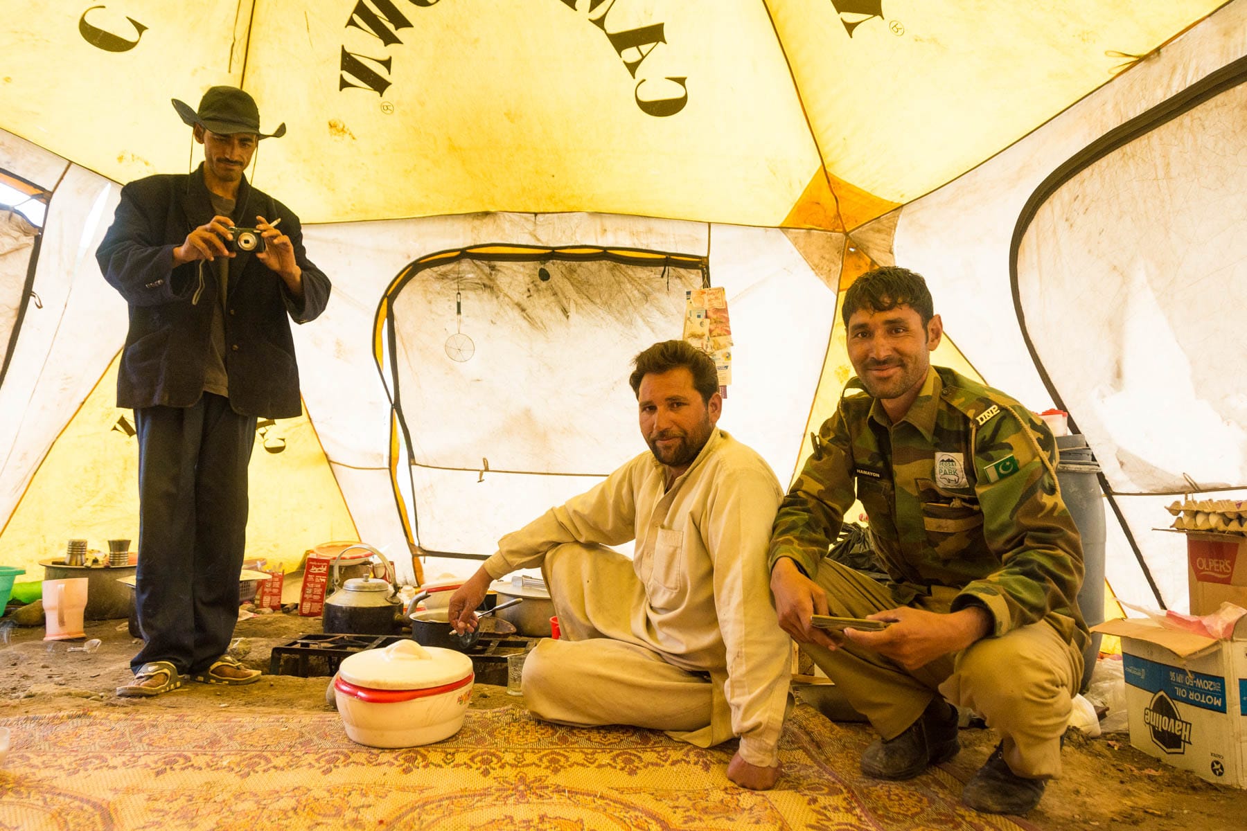 Three male park rangers in Deosai, Pakistan