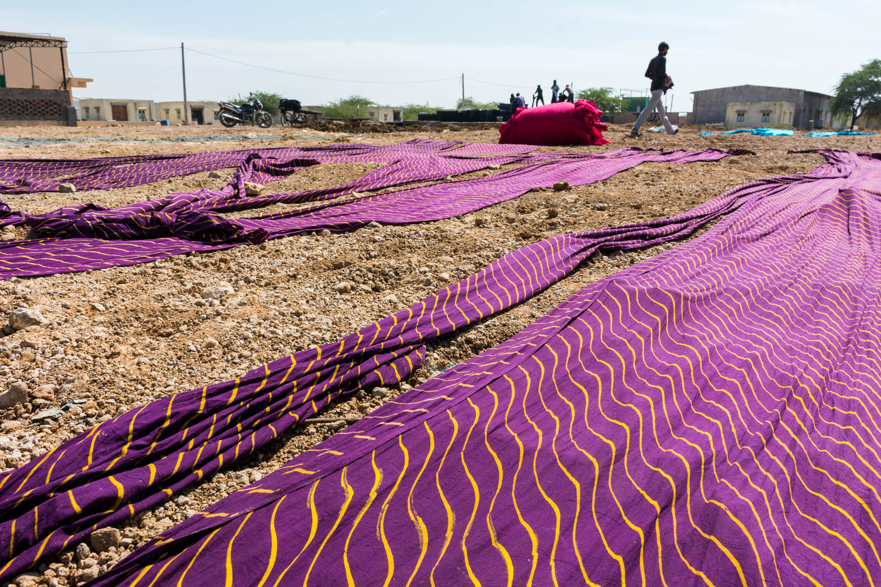 Textiles and crafts of Kutch, Gujarat, India - Block printed fabric drying in the sun in Ajrakhpur - Lost With Purpose
