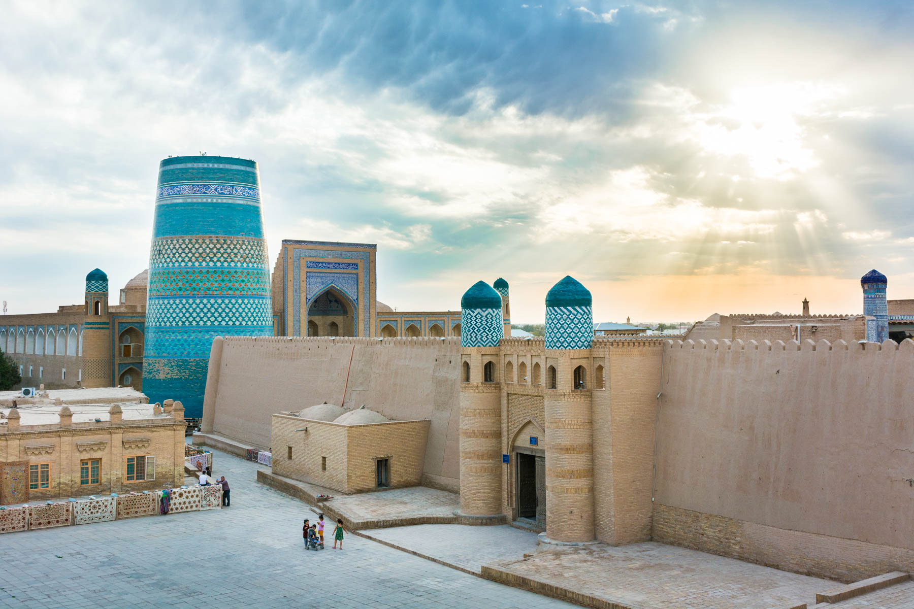 The sun breaking through the clouds over Khiva