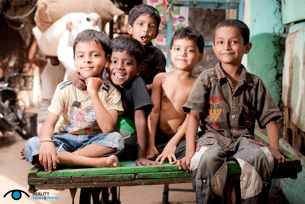 Is it weird to go on a slum tour in Mumbai, India? - Children in Dharavi slum - Image by Reality Tours