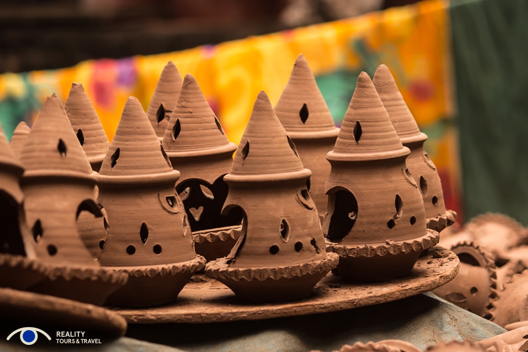 Is it weird to go on a slum tour in Mumbai, India? - Pottery in Dharavi slum - Photo by Reality Tours & Travel