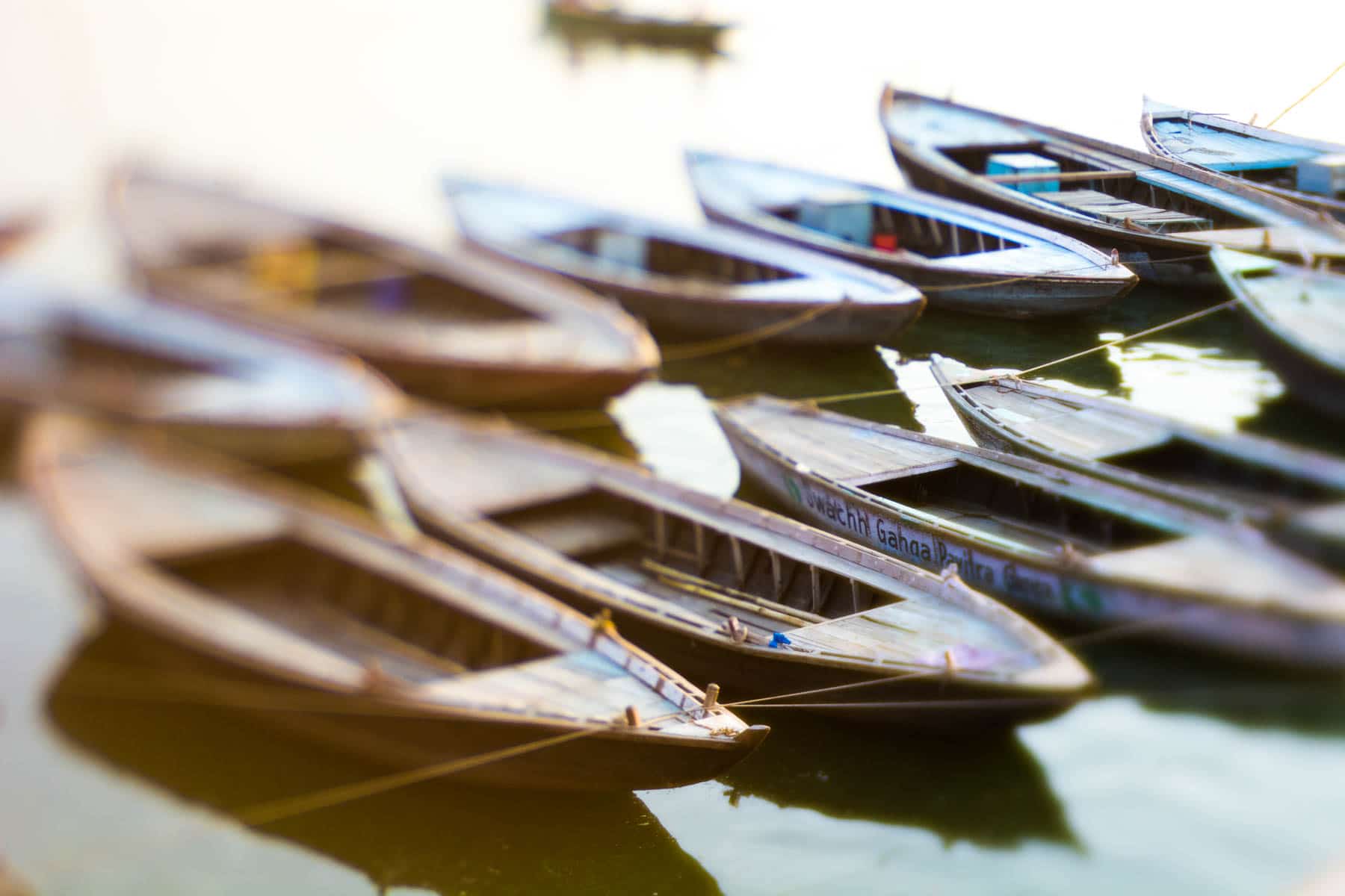 Lensbaby Edge 50 Optic review - Boats on the Ganges at sunrise in Varanasi, India - Lost With Purpose