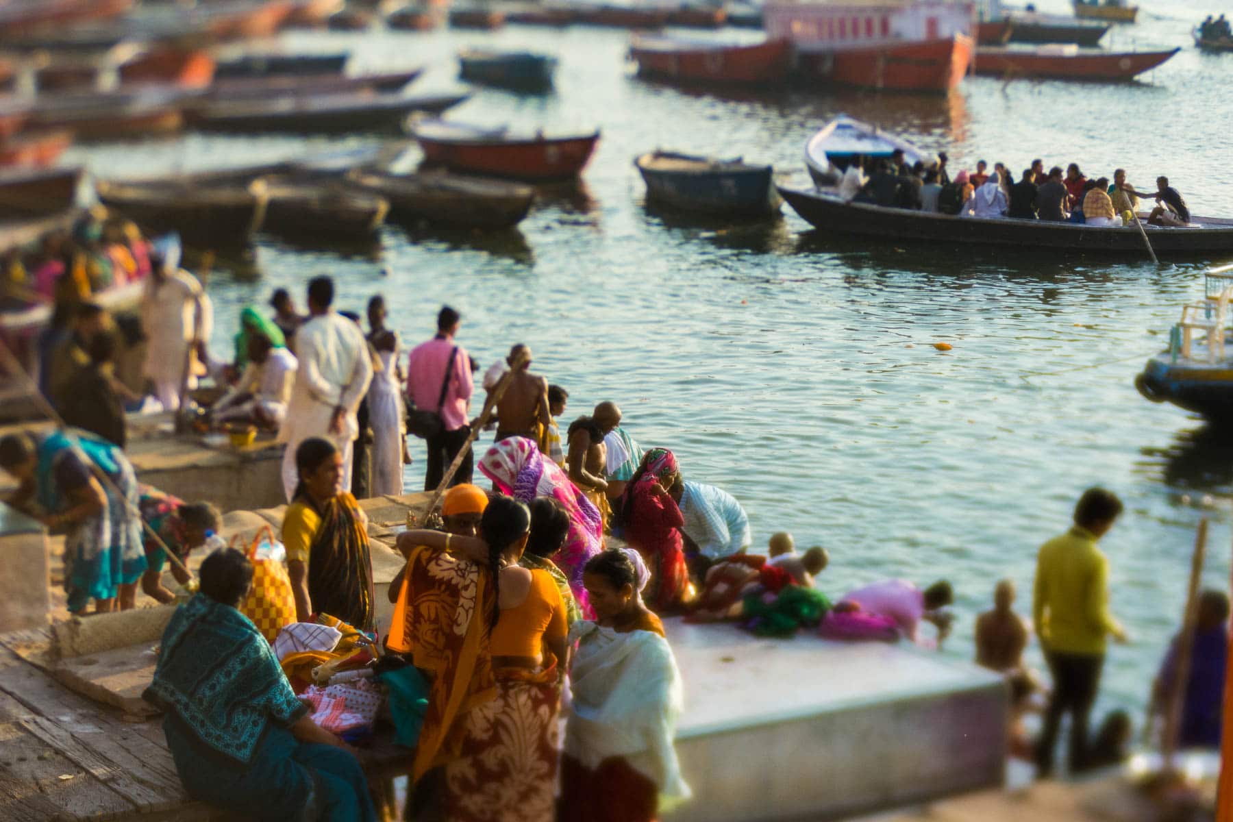 Lensbaby Edge 50 Optic review - Men and women waiting to take a boat ride on the Ganges in Varanasi, India - Lost With Purpose