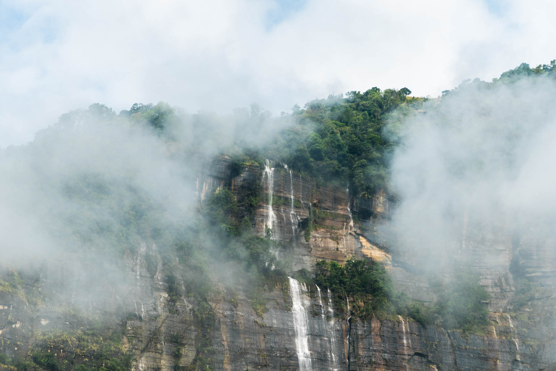 Waterfalls and clouds over Nongriat village