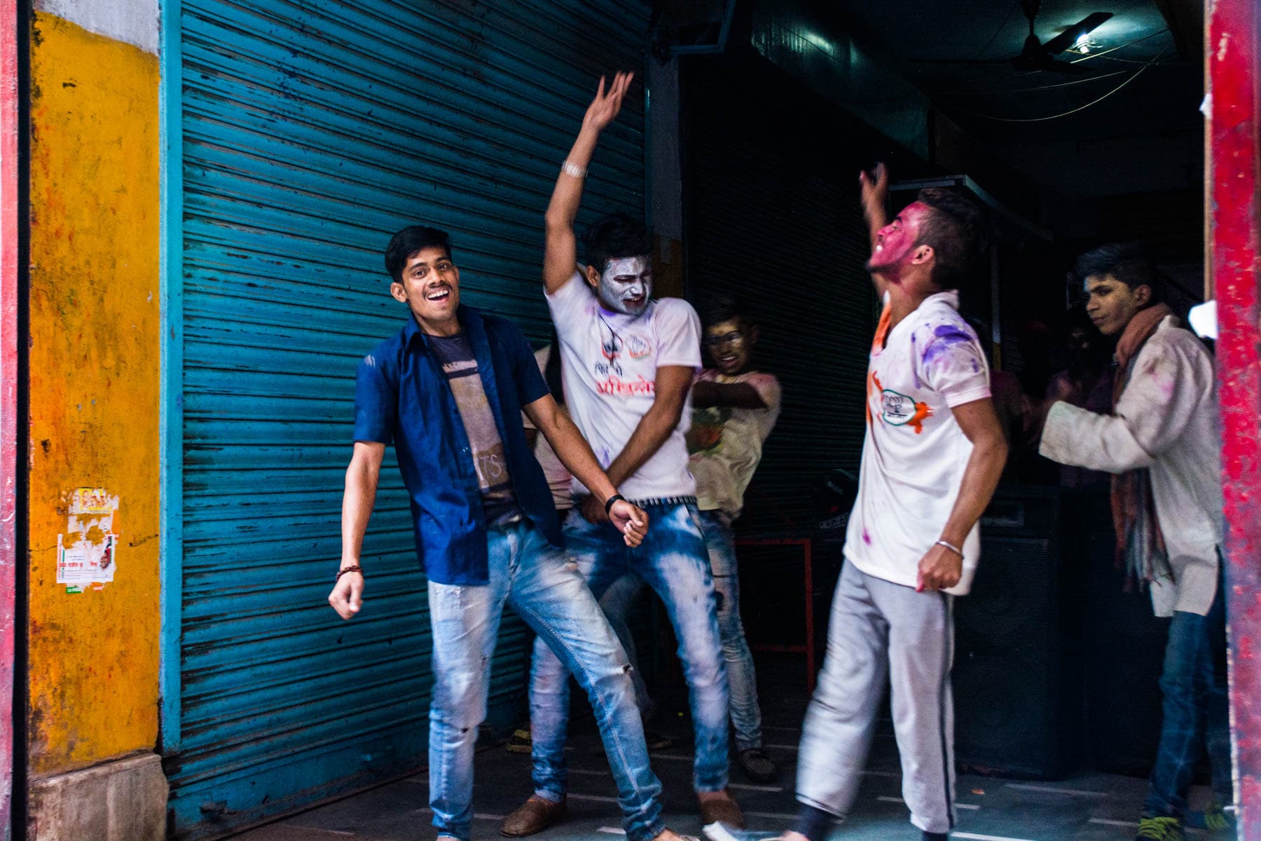 What you need know about playing Holi in Varanasi, India - Boys having a dance party - Lost With Purpose