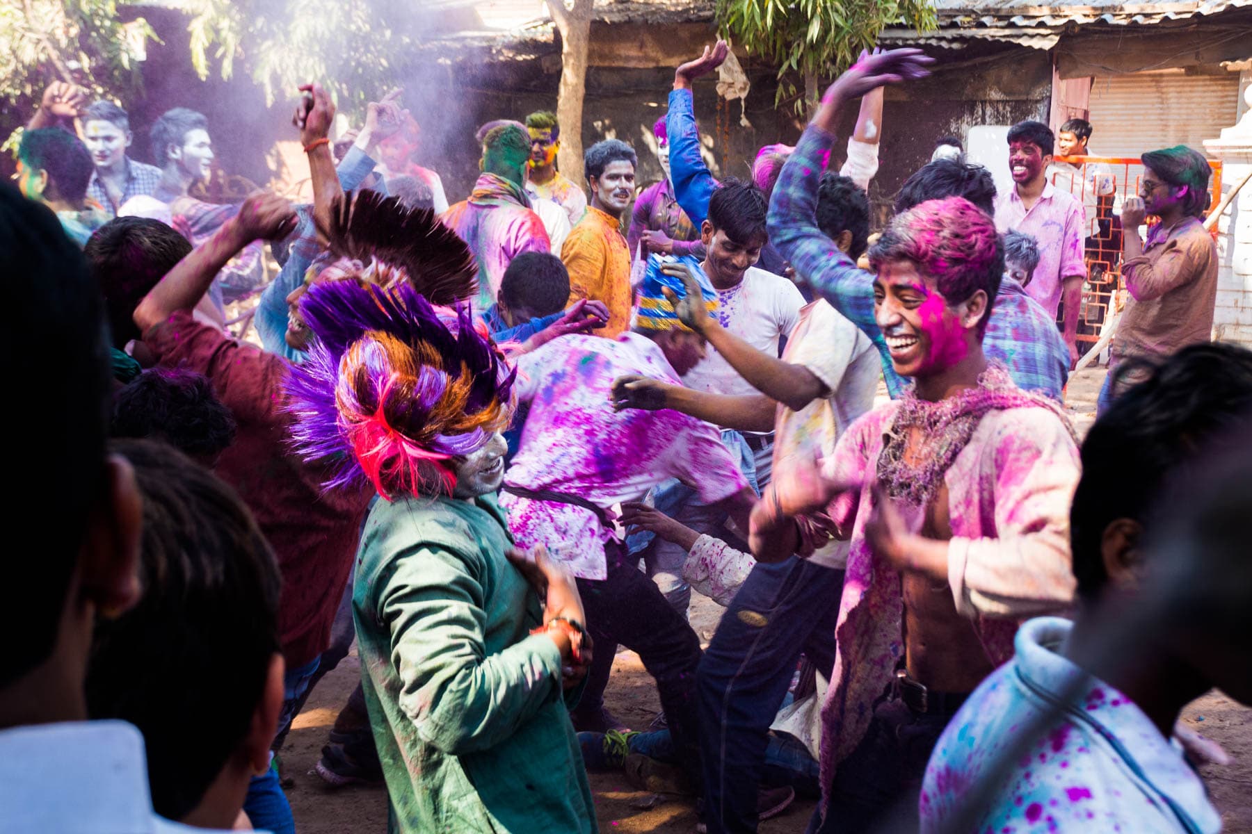 Celebrating Holi as a woman in Varanasi, India - Groups of boys dancing during Holi in Varanasi - Lost With Purpose