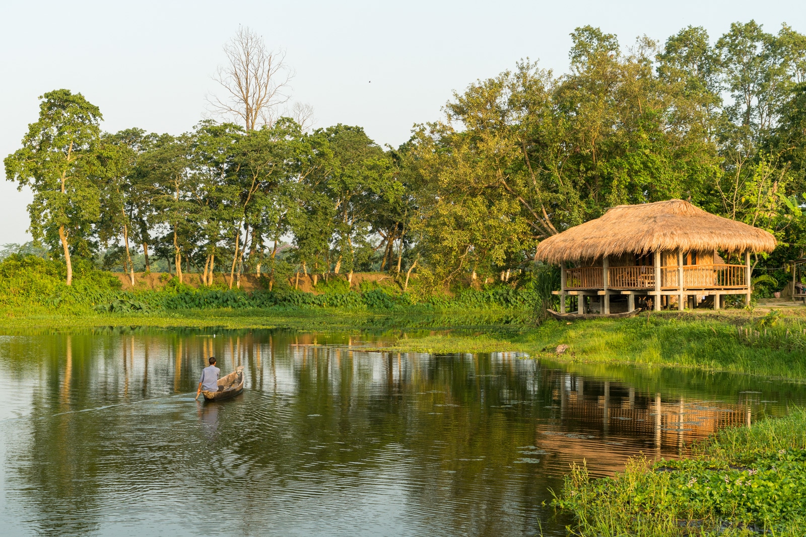 How to get from Sivsagar to Jorhat to Majuli island in Assam, India - Ygdrasill Bamboo Cottage at sunrise - Lost With Purpose