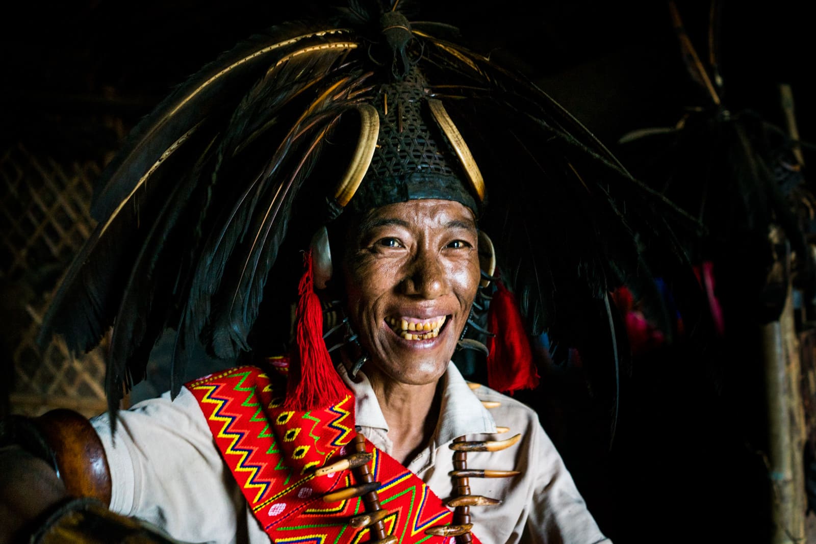 Nyakto in headhunter warrior dress and headdress