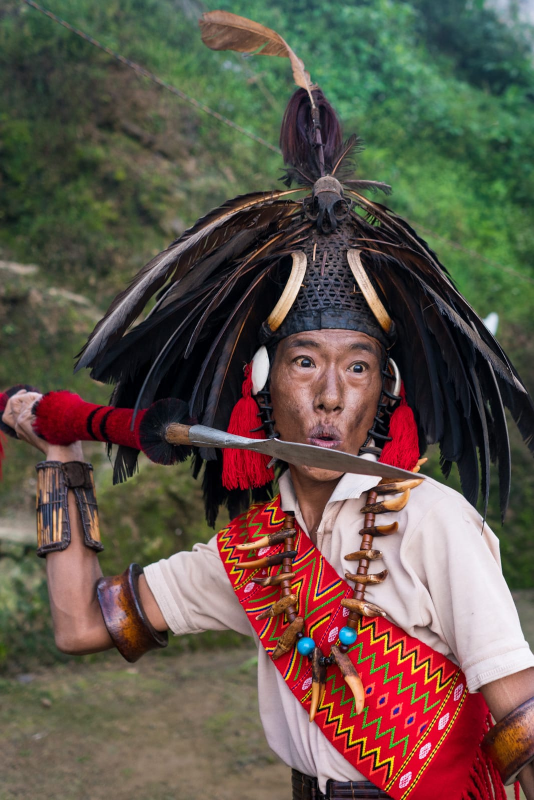 A local man from Longwa village, Nagaland, India hefting a traditional spear.