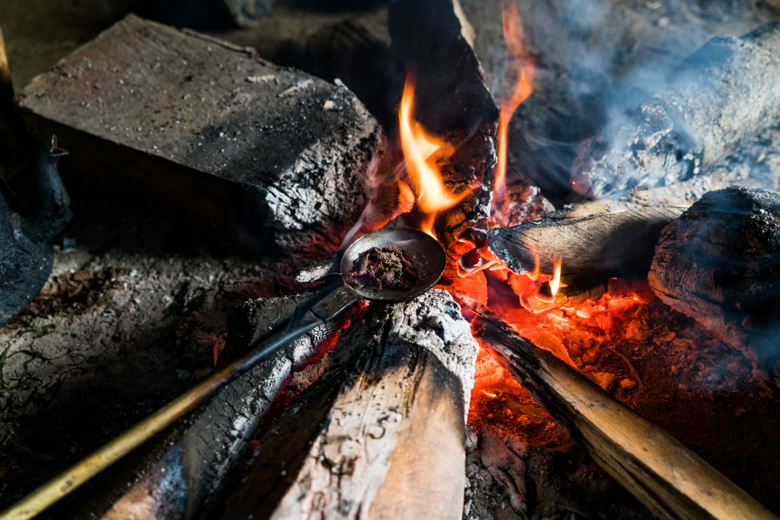 Spoon of opium cooking on a fire