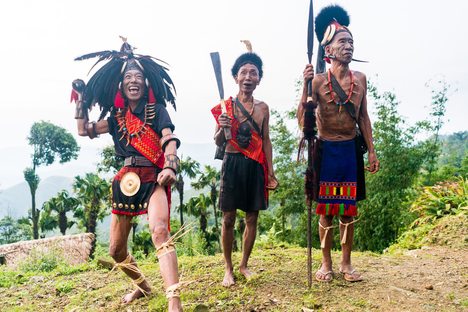 Local men in headhunter warrior gear