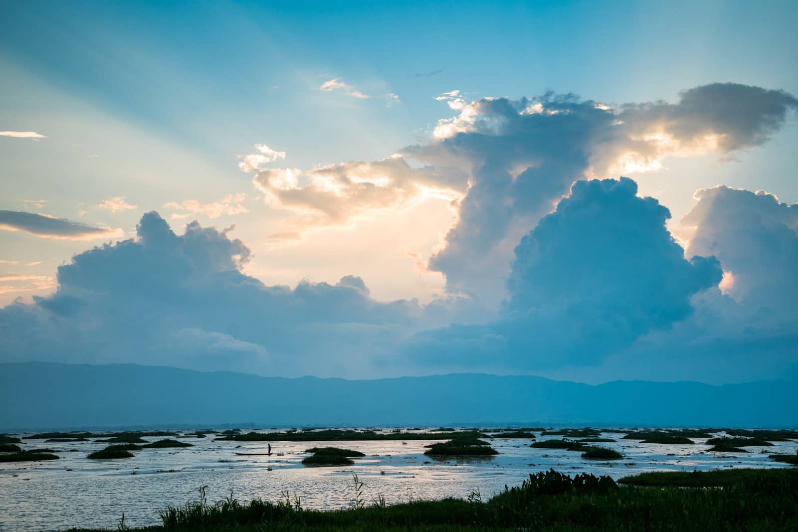 How to get from Imphal to Loktak Lake in Manipur, India - Sunset and clouds over Loktak Lake - Lost With Purpose travel blog