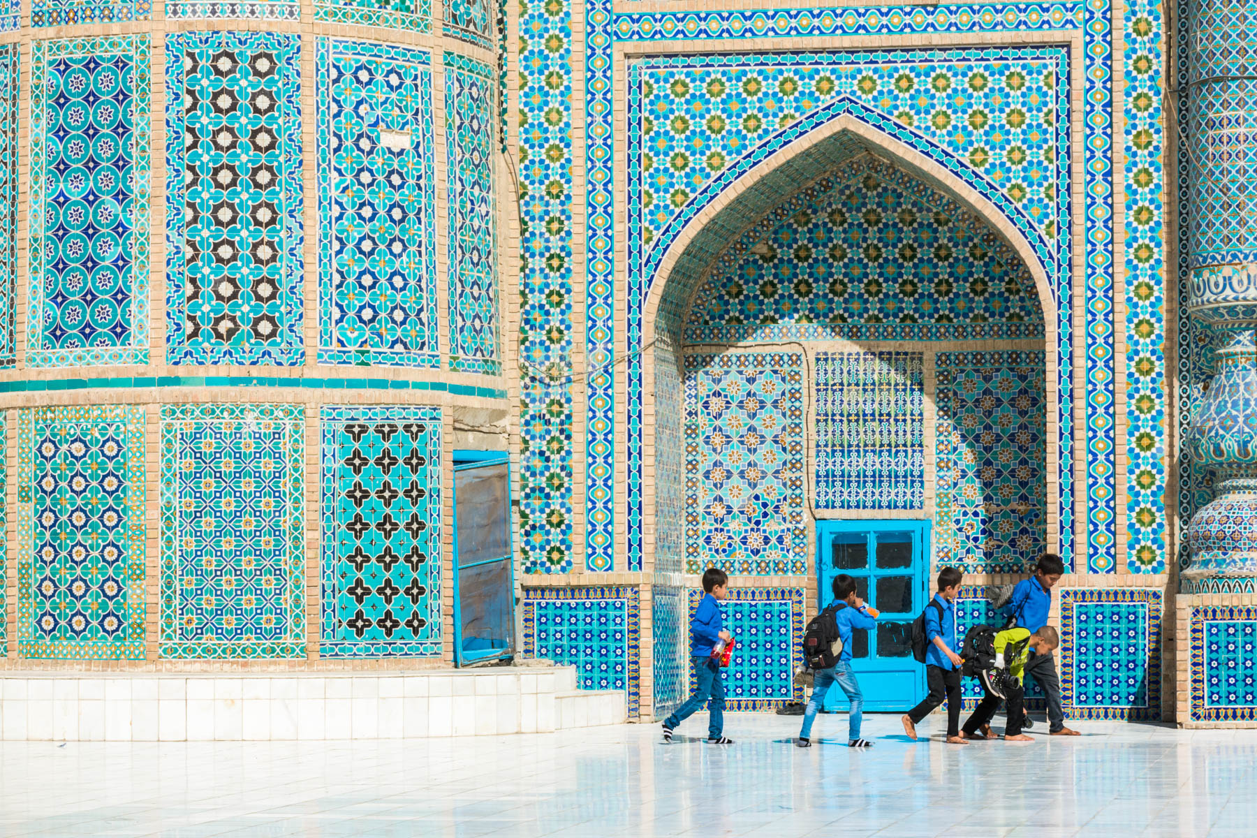 Photos of Mazar-i-Sharif, Afghanistan - Young boys playing in front of the Blue Mosque (Shrine to Ali) after school - Lost With Purpose