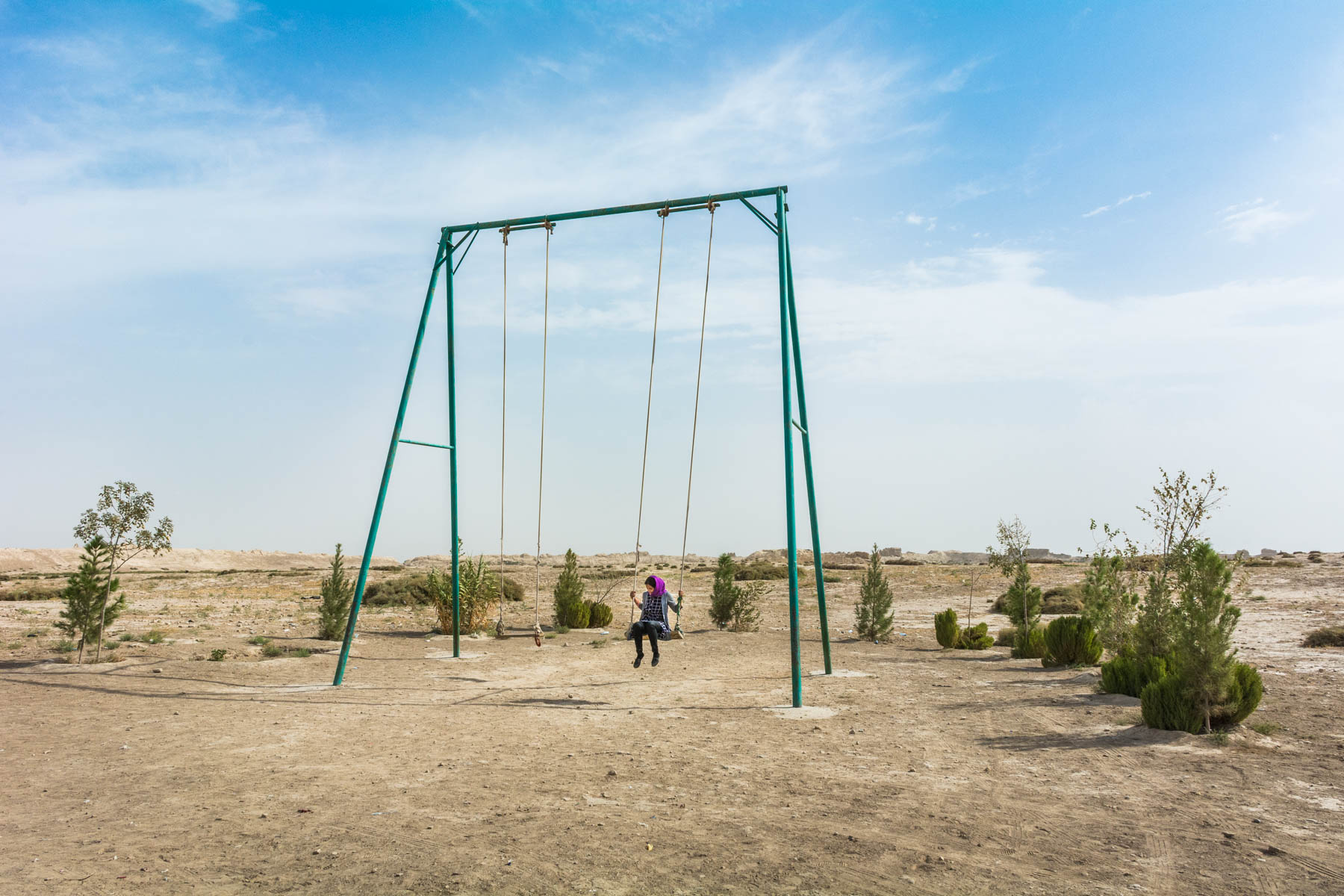 Photos of Balkh, Afghanistan - A girl swinging in Old Balkh - Lost With Purpose