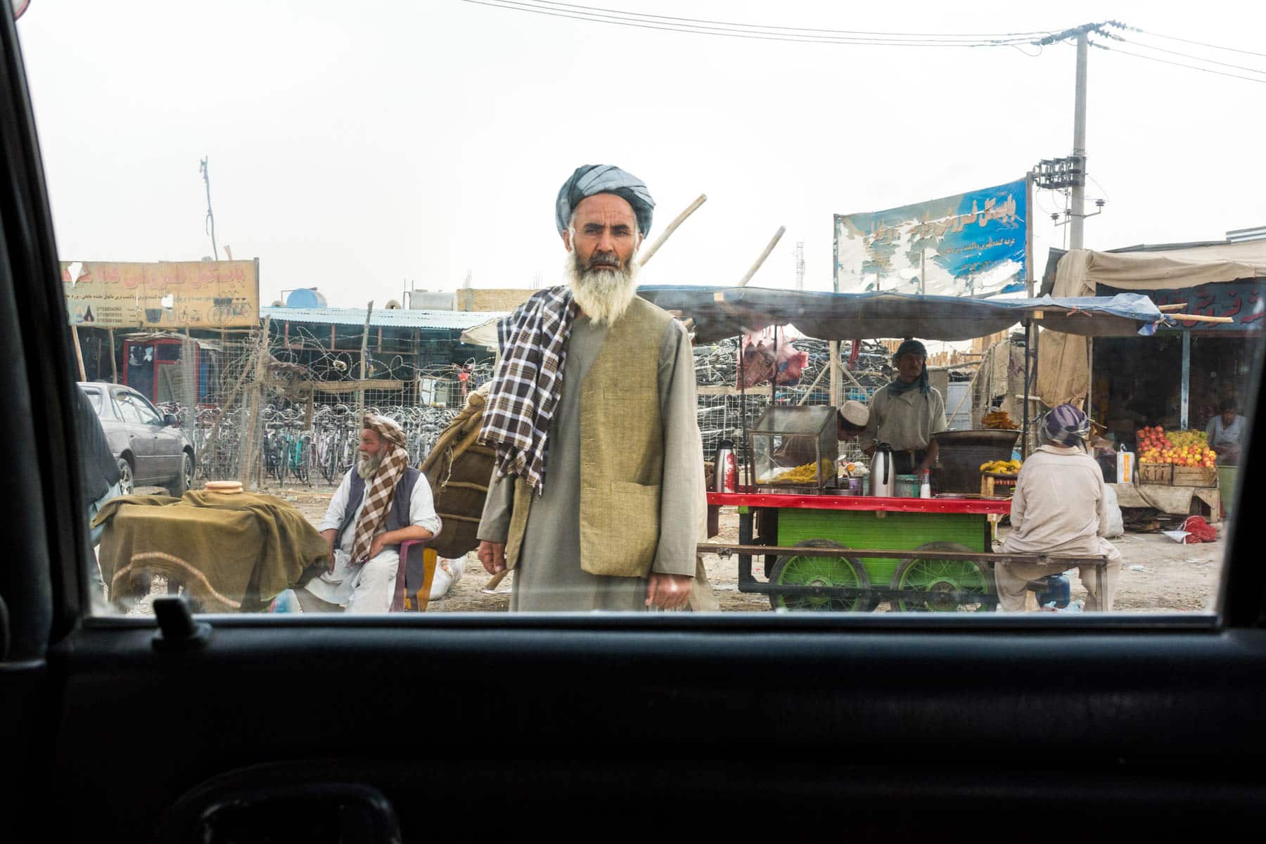 Photos of Mazar-i-Sharif, Afghanistan - A man with beard and turban on the side of the road - Lost With Purpose