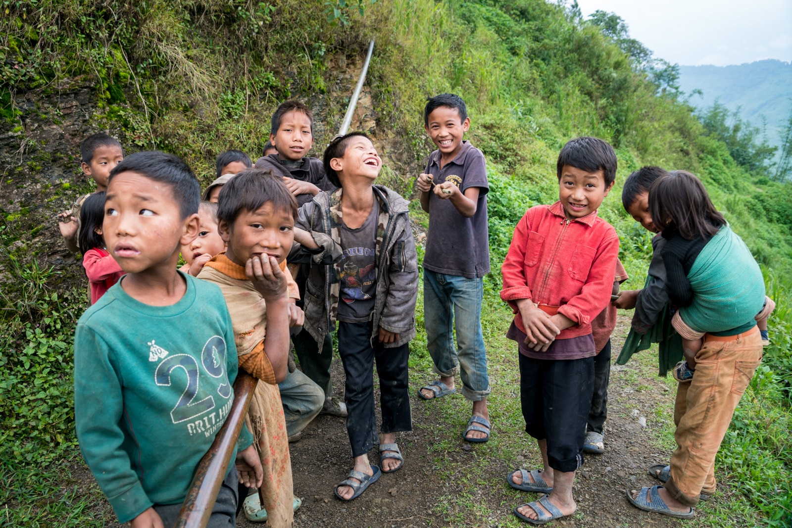 Snapshots of traditional culture in Longwa village, Nagaland, Northeast India - Group of boys in Longwa - Lost With Purpose Travel Blog