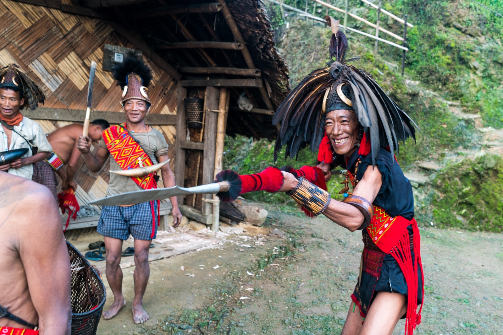 Snapshots of traditional culture in Longwa village, Nagaland, Northeast India - Nyakto playing around with a spear - Lost With Purpose