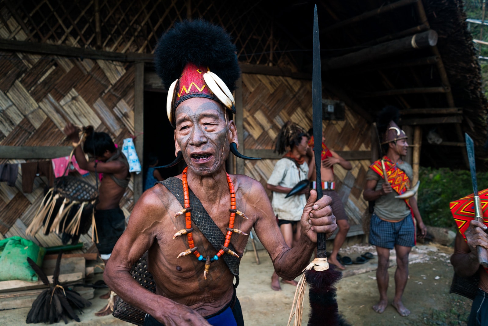 Photos of traditional tribal culture in Longwa village, Nagaland, Northeast India - Tattooed headhunter man in Longwa - Lost With Purpose Travel Blog