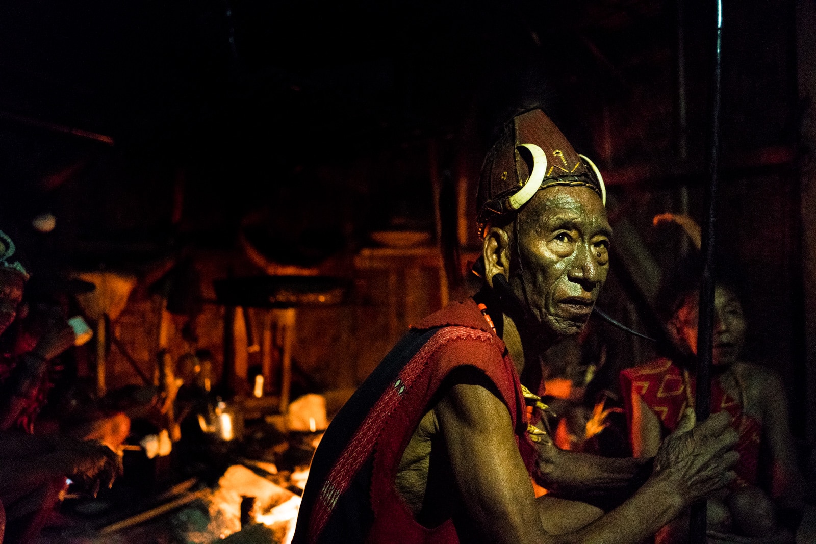 Snapshots of traditional tribal culture in Longwa village, Nagaland, Northeast India - Headhunter man in traditional clothes - Lost With Purpose