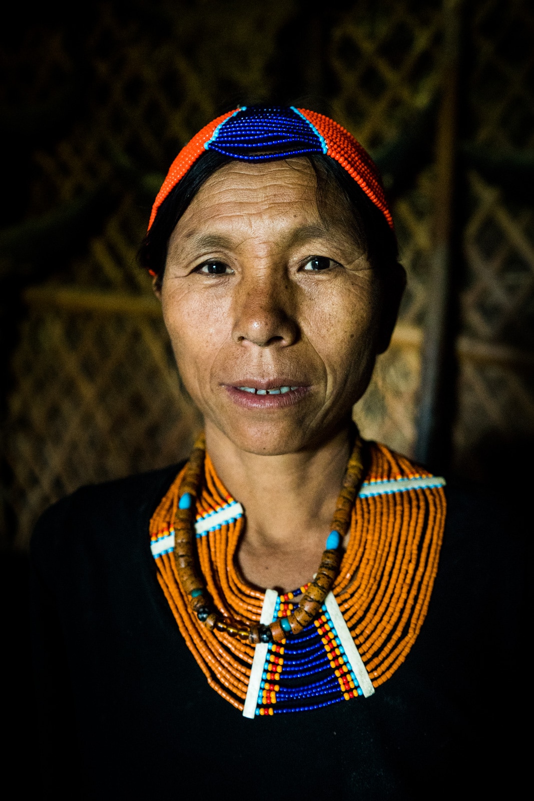 A woman from Longwa village, Nagaland, in traditional tribal clothes.