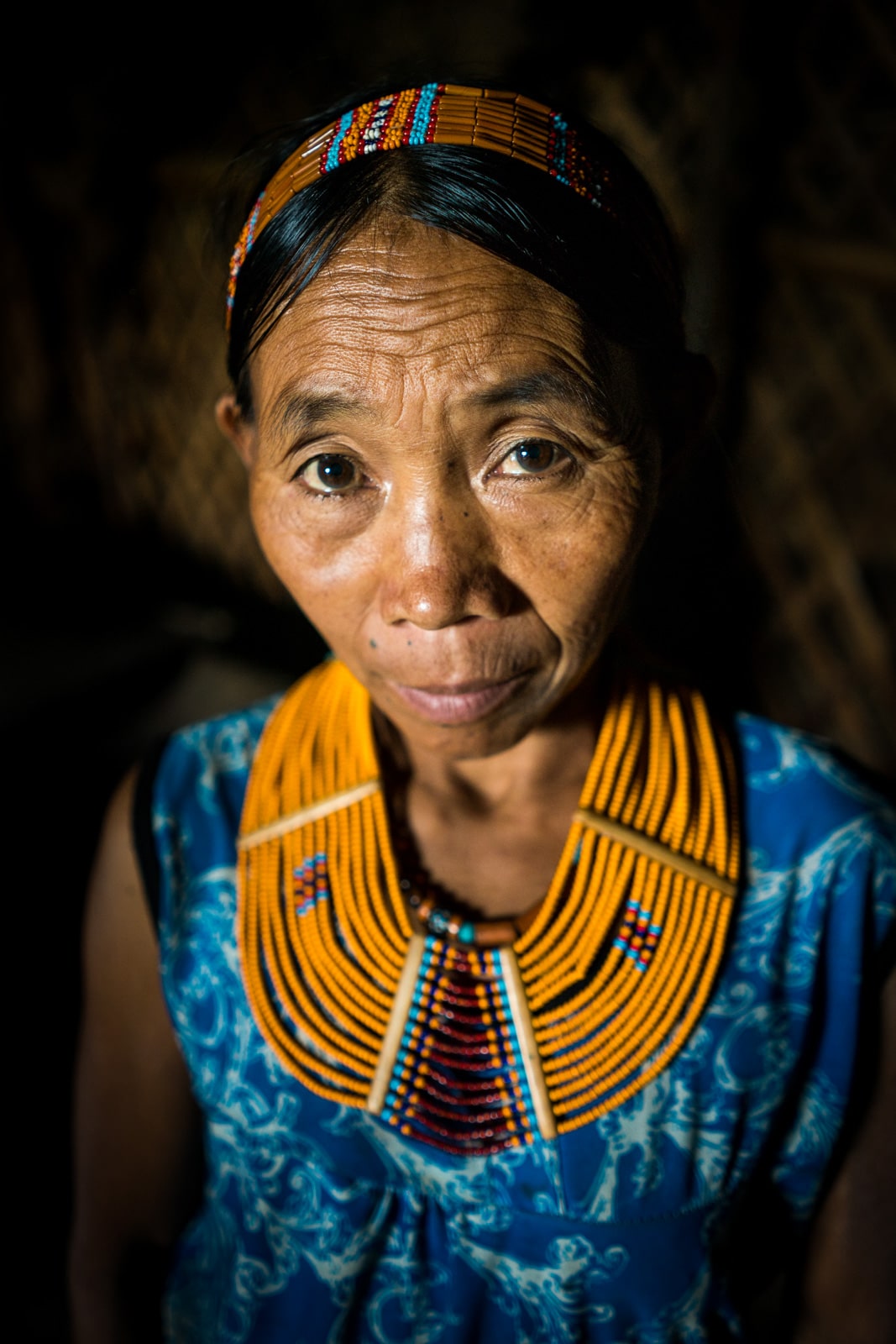 A woman from Longwa village, Nagaland, in traditional tribal clothes.