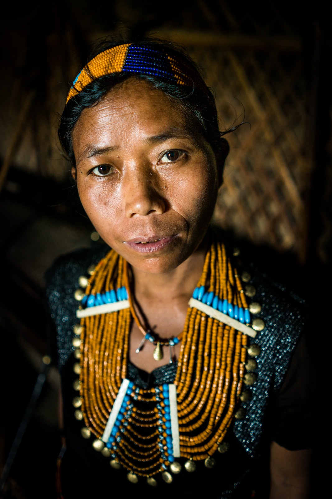 A woman from Longwa village, Nagaland, in traditional tribal clothes.