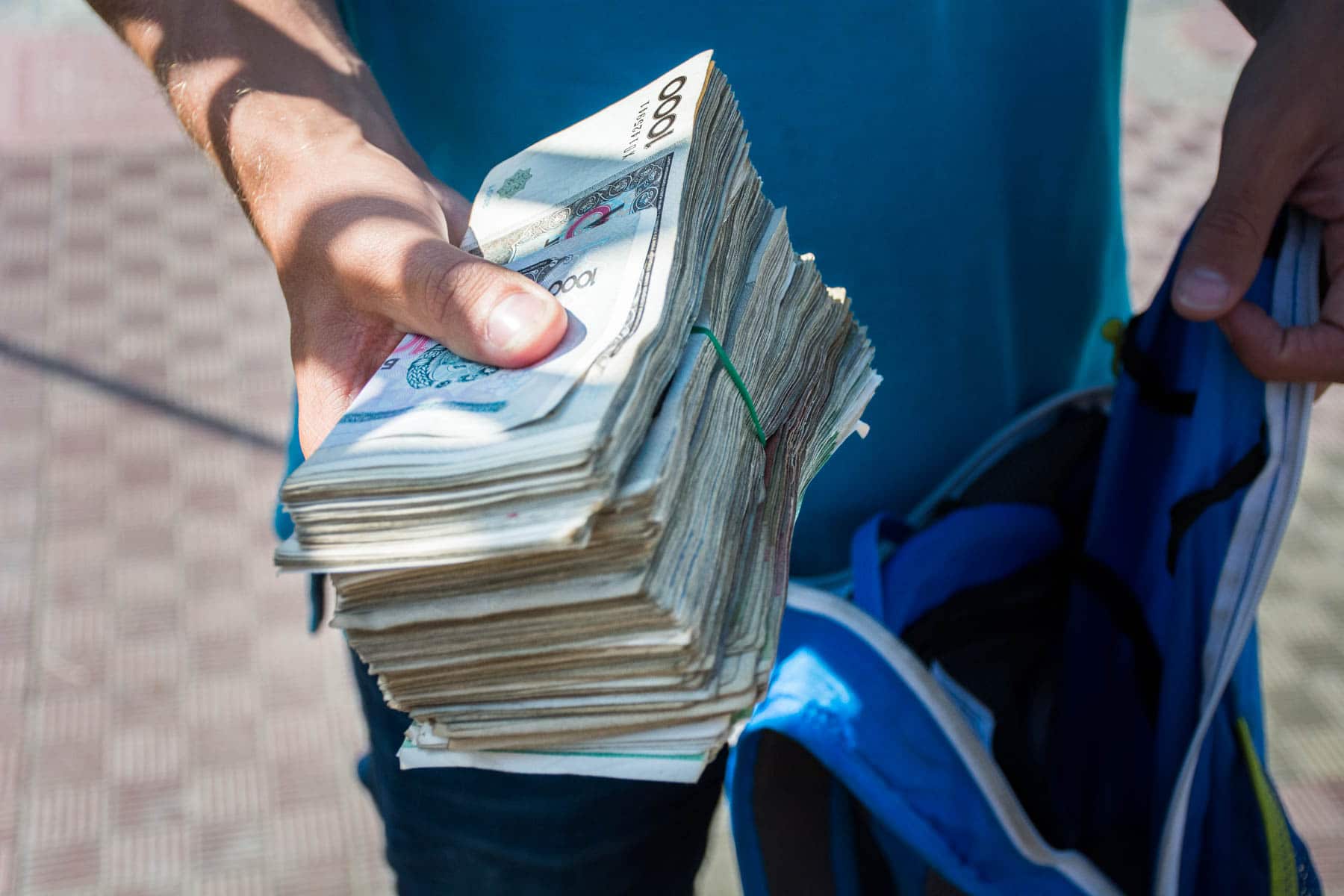 A large stack of Uzbek money