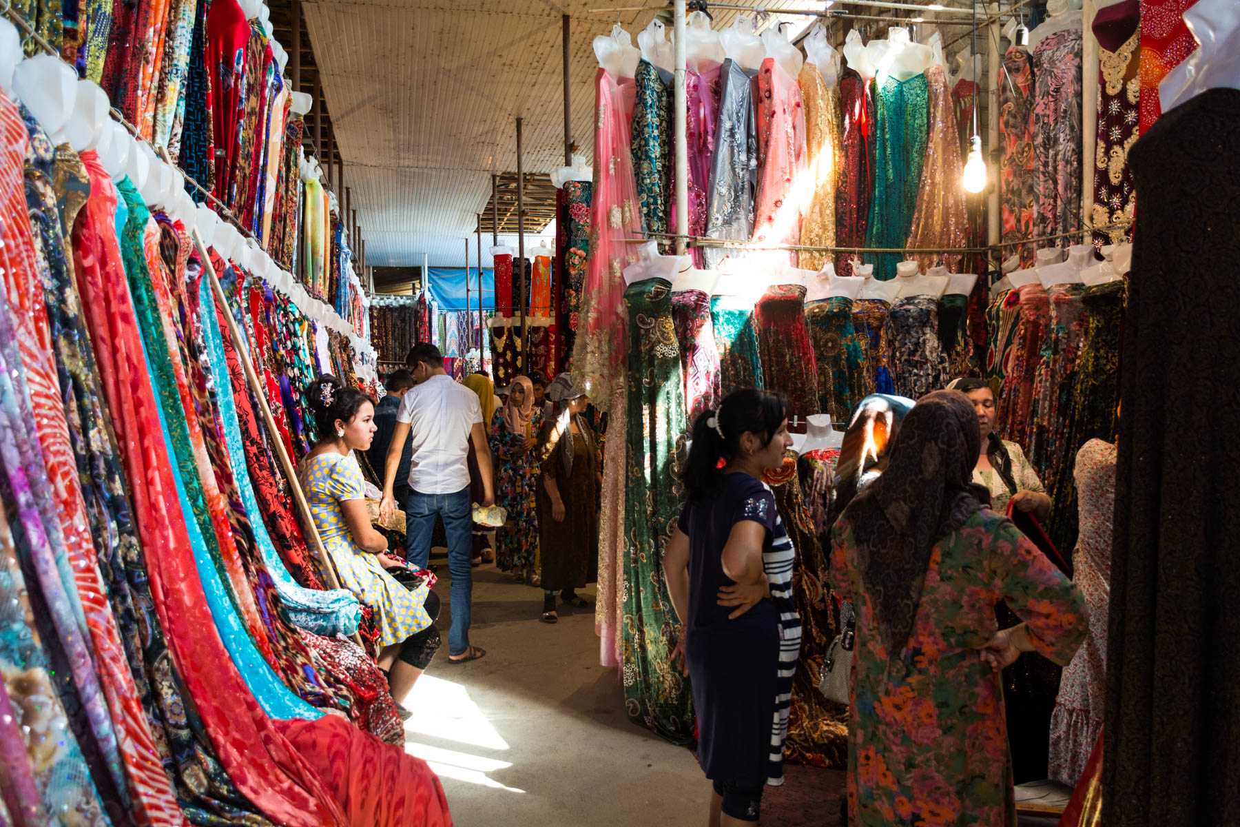 A girl sitting in the Andijan bazaar in the Fergana Valley in Uzbekistan