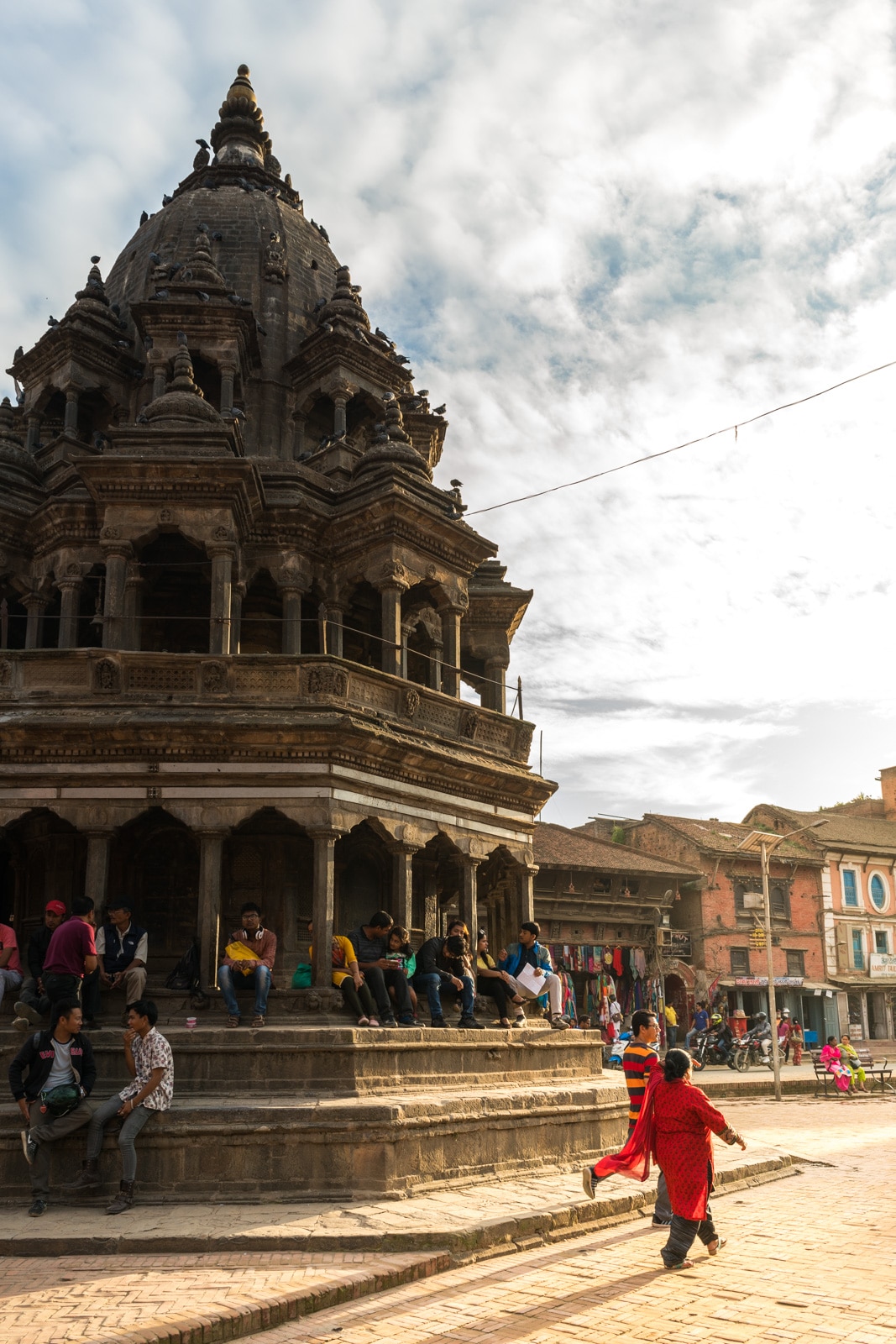 Dramatic lighting during sunset at the famous Durbar Square in Patan, Nepal. Only half an hour from central Kathmandu, Patan's old city is a must visit sight near Kathmandu.