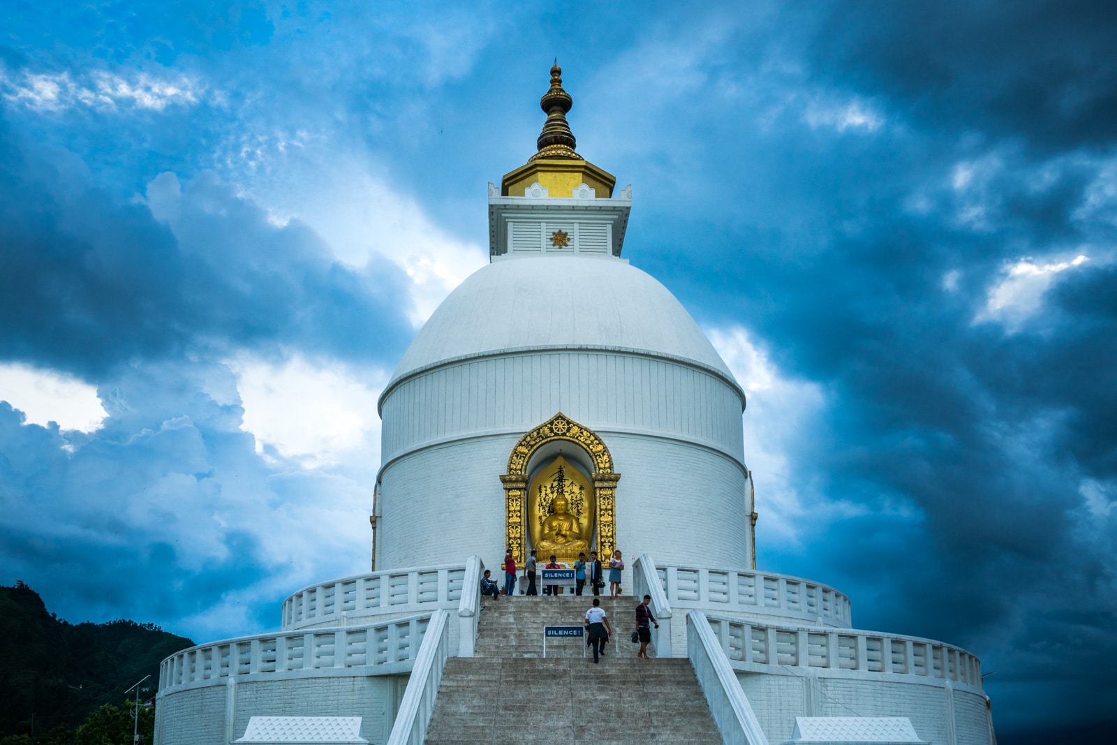 Travel in Nepal during monsoon season - World Peace Pagoda in Pokhara during rain - Lost With Purpose travel blog