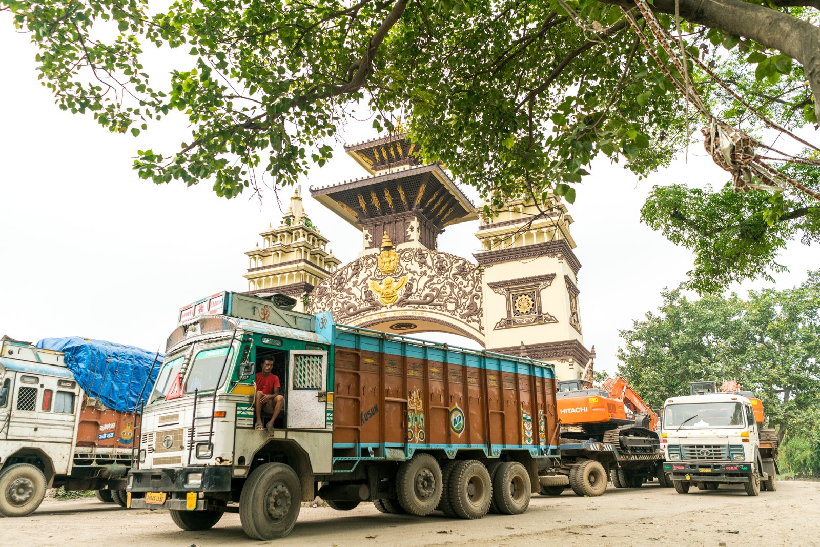 Overland at the Nepal - India border crossing at Birganj and Raxaul - Shipping trucks at the border gate - Lost With Purpose