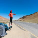 Alex hitchhiking the Leh - Manali highway in India - Lost With Purpose travel blog