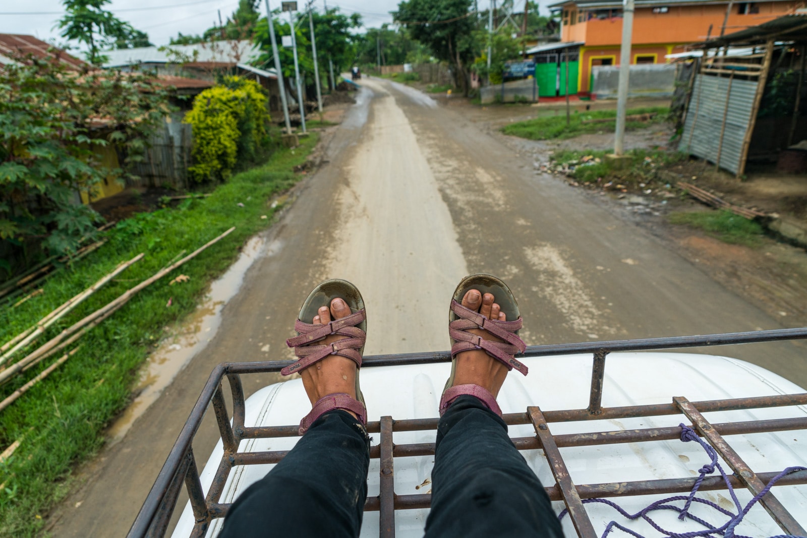 Why you need to travel to Northeast India - Riding on top of a Tempo taxi near Loktak Lake, Manipur - Lost With Purpose travel blog