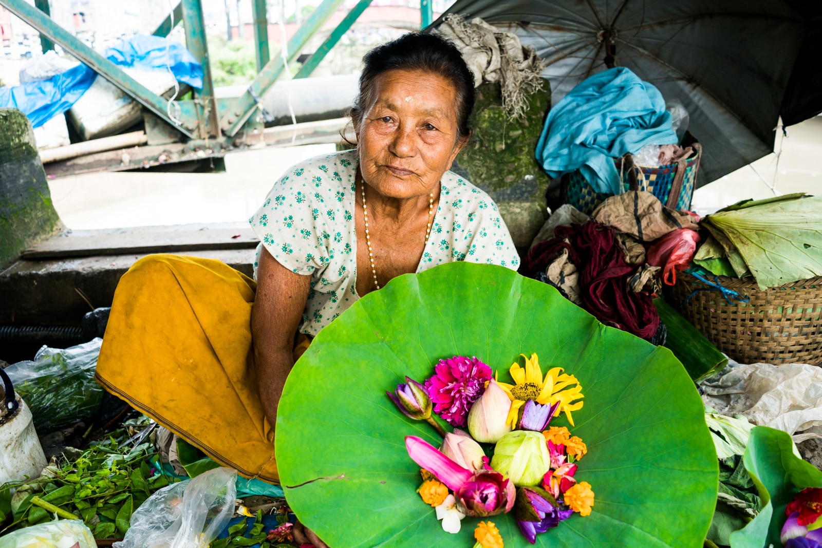 Why you need to visit Northeast India - Flower market woman in Imphal, Manipur - Lost With Purpose travel blog