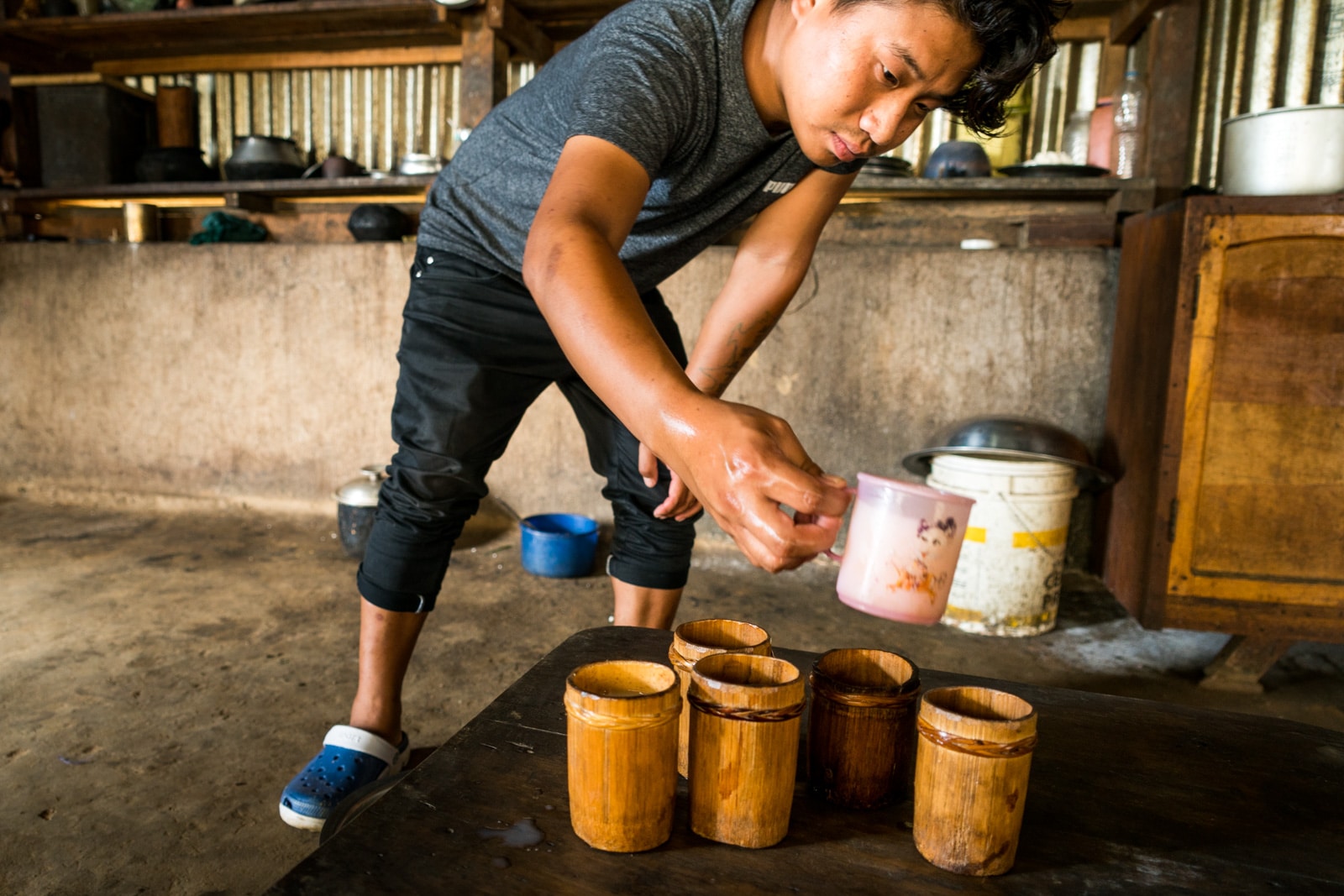 5 reasons to visit Northeast India - Sharing Manipuri yu rice beer with friends - Lost With Purpose travel blog