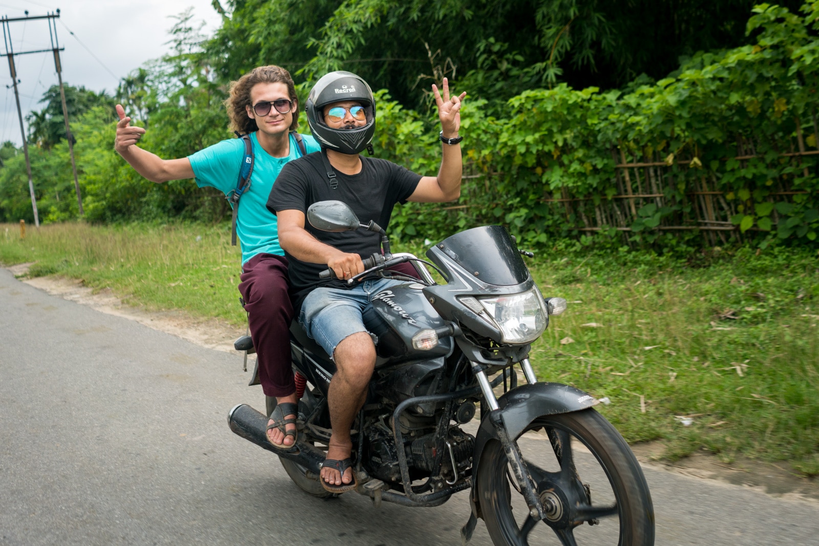 Why you need to travel in Northeast India - Sebastiaan motorbiking around with a friend in Guwahati, Assam - Lost With Purpose travel blog